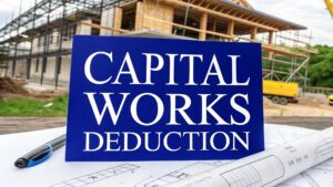 Capital works deduction sign in front of a building under construction, representing property tax deductions under ATO Division 43.