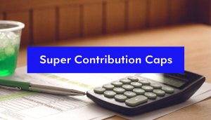 Calculator and financial documents with text overlay “Super Contribution Caps” representing superannuation limits and tax planning