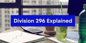 Professional advisors discussing superannuation tax planning and Division 296 changes in a modern office
