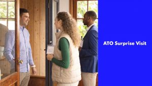 ATO officers showing identification during a surprise business visit to a business owner at the door