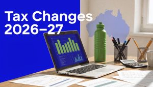 Laptop displaying financial charts beside office supplies with “Tax Changes 2026–27” text and Australia map graphic representing Federal Budget tax updates.