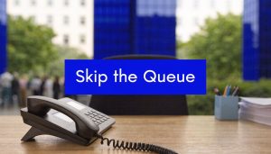 Tax agent phone on desk with “Skip the Queue” message representing faster ATO call routing using fast key codes