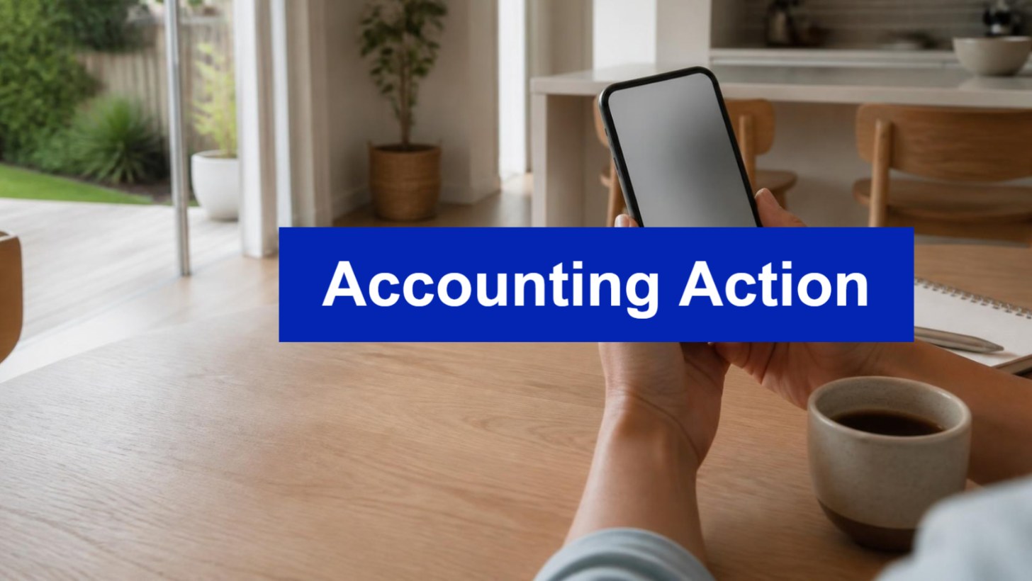 Person checking a phone at a kitchen table with an Accounting Action banner, illustrating the ATO accounting action in progress status