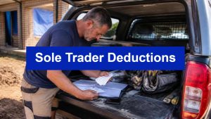 Tradie sorting receipts in his ute, illustrating sole trader deductions